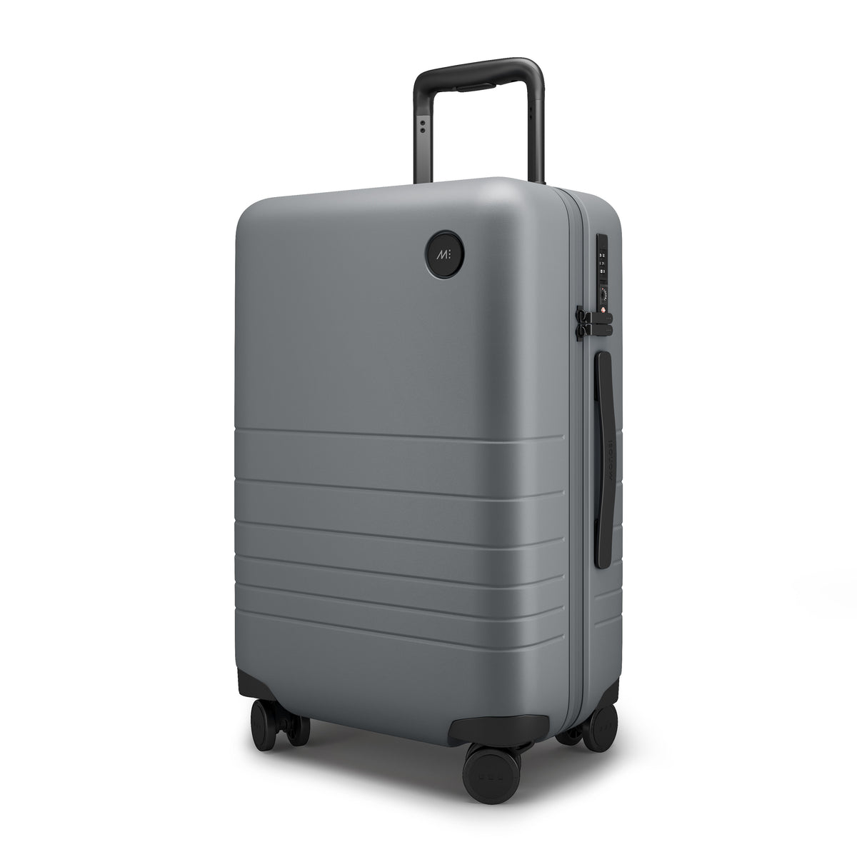 A carry-on in storm grey standing upright, featuring a telescopic handle and four spinner wheels.