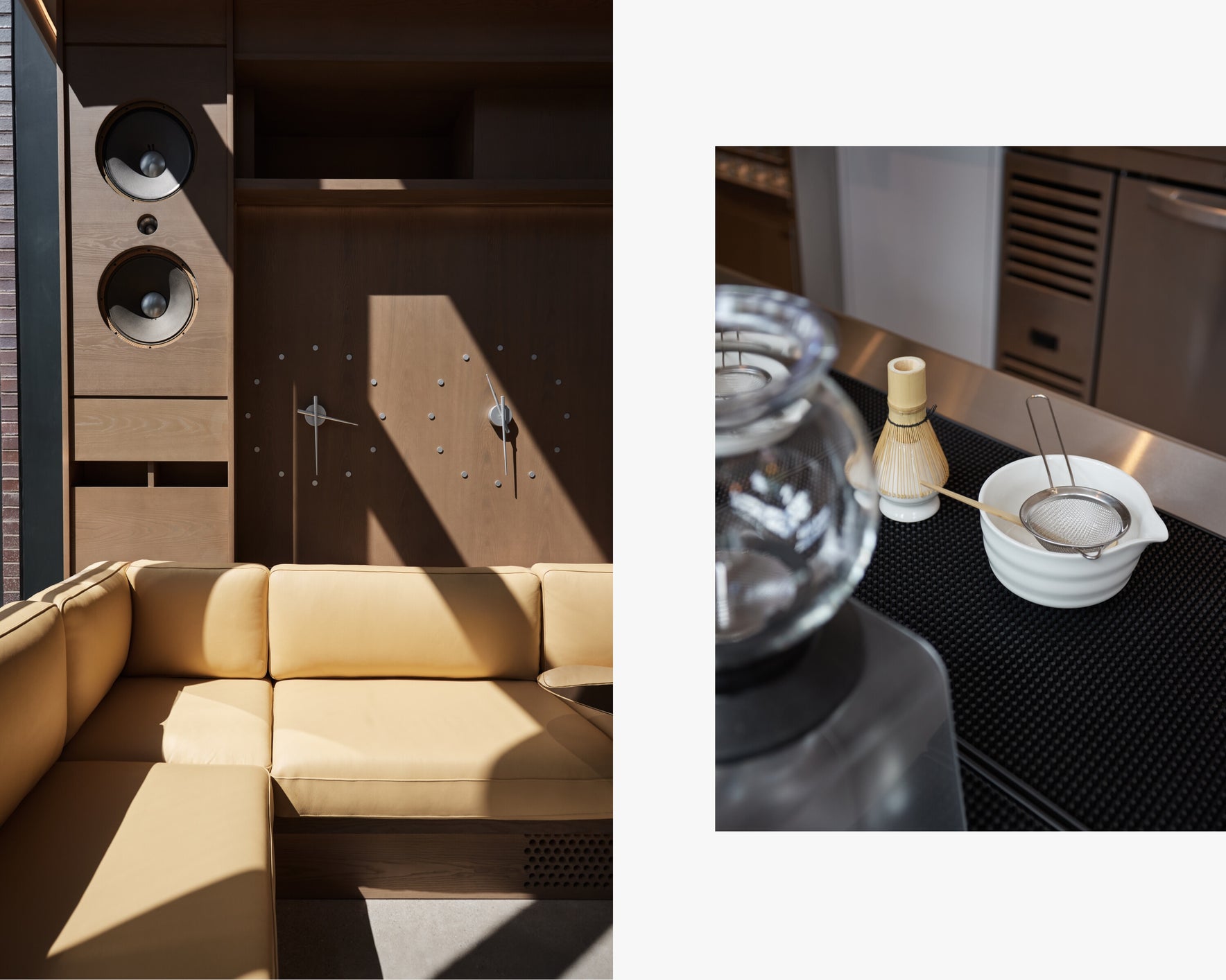 Beige sofa in a modern interior setting with wooden paneling and a glass container on a surface.