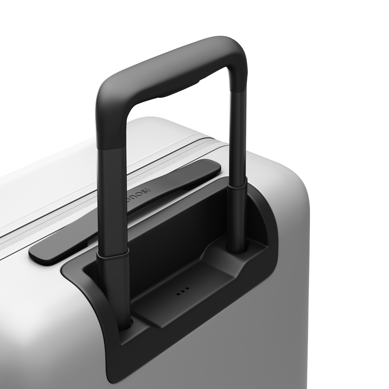 Close-up of a telescopic handle extended from a Monos suitcase.